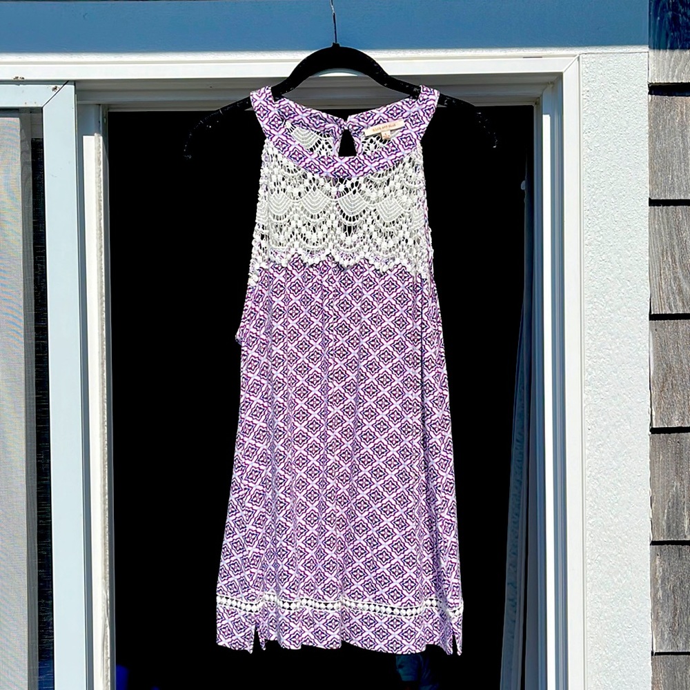 High neck tank top with key hole cut out in back. Cotton lace detailing.
